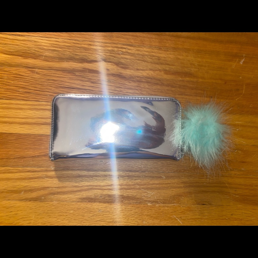 SILVER FOREVER 21 WALLET WITH TEAL PUFF BALL
